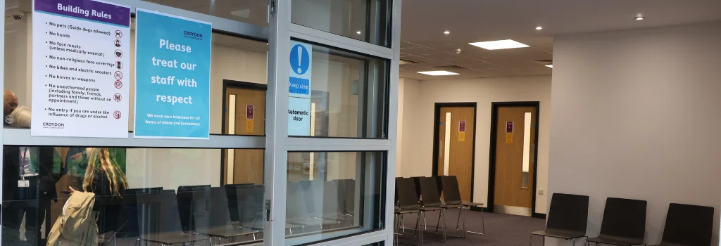 The waiting area and interview room doors at Cavendish House