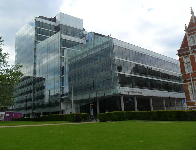 Bernard Weatherill House, Croydon Council's glass-fronted offices on Fell Road, seen across a lawn