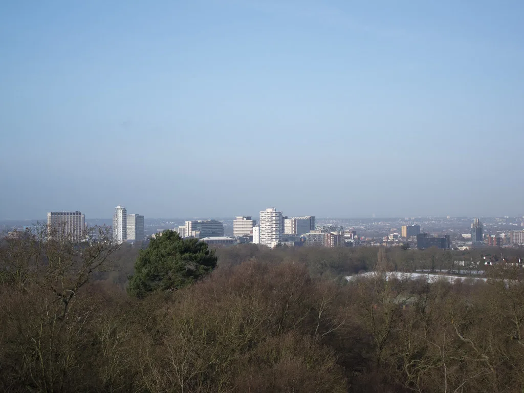 Croydon town centre seen across the wooded Addington Hills. The draft plan's growth location runs between the edge of the built-up area and New Addington