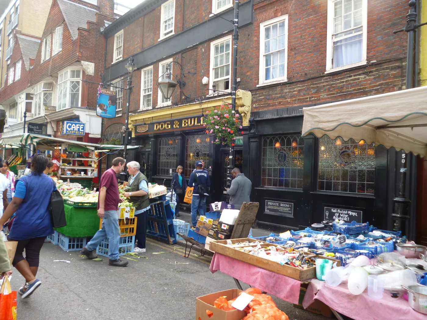 The pub on Surrey Street, Croydon, when it traded as the Dog and Bull, with the market stalls outside